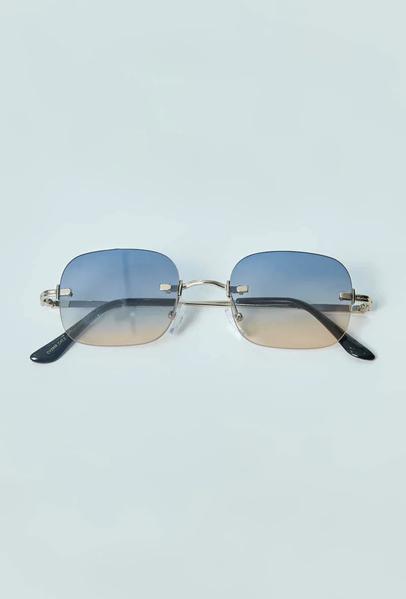 Randloze heren zonnebril met blauw gradient glazen en metalen pootjes - Cityvibes