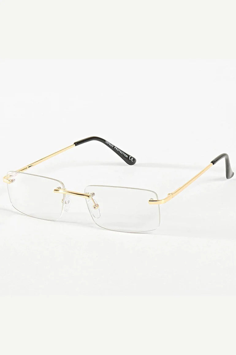 Randloze transparante zonnebril met goudkleurige pootjes - voorkant weergave